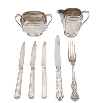 Lot 627 - Three George III sterling silver dessert knives, London 1814 by Moses Brent