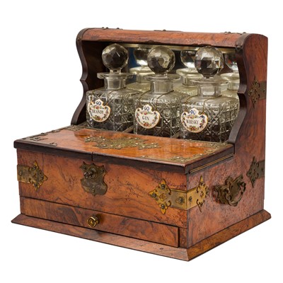 Lot 454 - A Victorian burr walnut three bottle tantalus