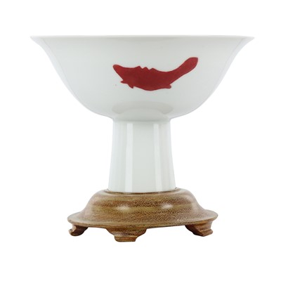 Lot 353 - A Chinese Ming-style copper-red 'fish' stem bowl, 20th century, Yongzheng mark