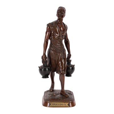 Lot 51 - Marcel Debut (French, 1865-1933), a bronze figure of a Moroccan water carrier