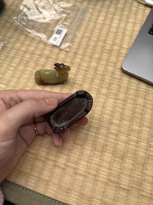 Lot 83 - A Chinese yellow jade carving of a camel, Qing dynasty