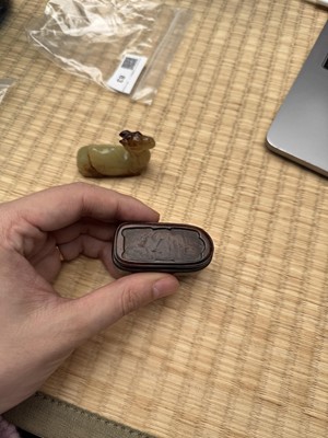 Lot 83 - A Chinese yellow jade carving of a camel, Qing dynasty