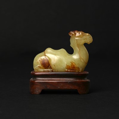 Lot 83 - A Chinese yellow jade carving of a camel, Qing dynasty