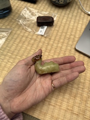 Lot 83 - A Chinese yellow jade carving of a camel, Qing dynasty