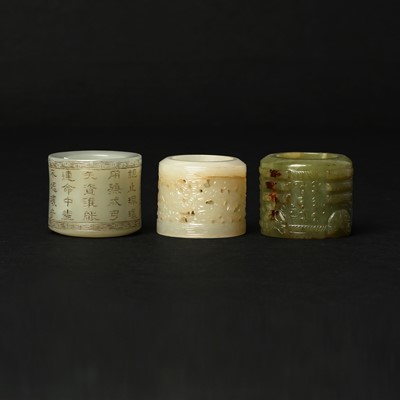 Lot 100 - Three Chinese jade archer rings, Qing dynasty