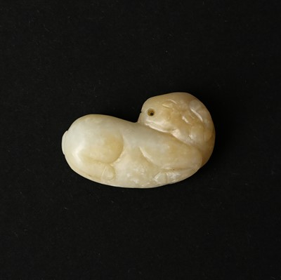 Lot 86 - A small Chinese celadon jade 'ram' carving, Qing Dynasty, 19th century
