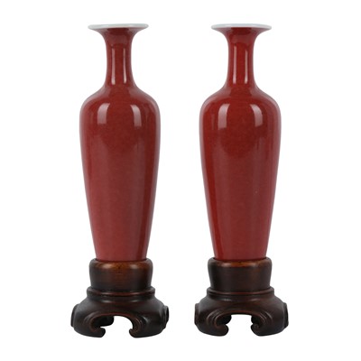 Lot 352 - A pair of Chinese peachbloom-glazed 'amphora' vases, liuye zun, 20th century