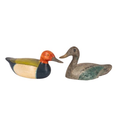 Lot 185 - Folk Art - Two carved and painted duck decoys, early to mid-20th century