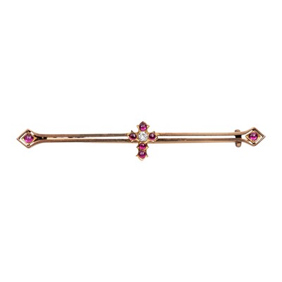 Lot 142 - A ruby and diamond cross brooch