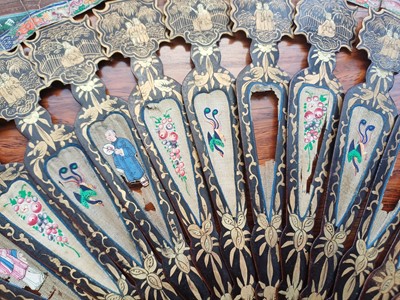 Lot 378 - λ A Chinese export 'figurative' folding fan, Qing dynasty, 19th century