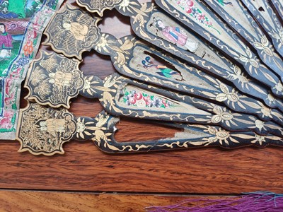 Lot 378 - λ A Chinese export 'figurative' folding fan, Qing dynasty, 19th century