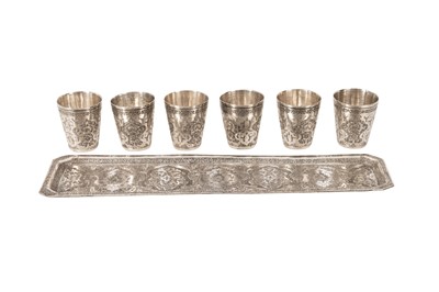 Lot 574 - A mid-20th century Persian (Iranian) silver shots set on tray, Isfahan circa 1960