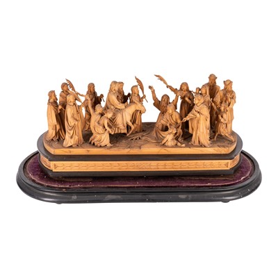 Lot 62 - A 19th century German carved limewood group of Christ's 'Triumphal entry into Jerusalem'