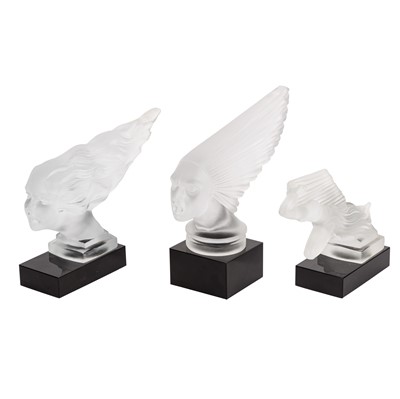 Lot 245 - Three frosted glass car mascots, on integrated plinths, in the manner of Lalique