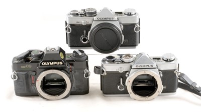 Lot 256 - Olympus OM-1, OM-2n & OM40 Camera Bodies for Spares or Repair.