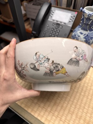 Lot 53 - A Chinese famille-rose 'fishermen' bowl, Qing dynasty, Yongzheng period