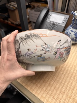 Lot 53 - A Chinese famille-rose 'fishermen' bowl, Qing dynasty, Yongzheng period
