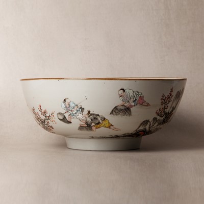 Lot 53 - A Chinese famille-rose 'fishermen' bowl, Qing dynasty, Yongzheng period