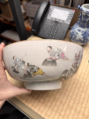 Lot 53 - A Chinese famille-rose 'fishermen' bowl, Qing dynasty, Yongzheng period