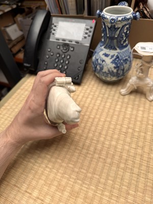 Lot 34 - A Chinese Dehua 'Songzi Guanyin' figure group, Qing dynasty, Kangxi period