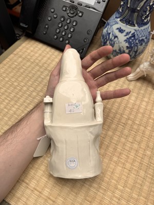 Lot 34 - A Chinese Dehua 'Songzi Guanyin' figure group, Qing dynasty, Kangxi period