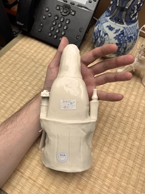 Lot 34 - A Chinese Dehua 'Songzi Guanyin' figure group, Qing dynasty, Kangxi period