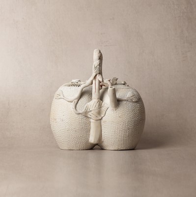 Lot 36 - A rare Chinese biscuit 'double peach' teapot, Qing dynasty, Yongzheng period