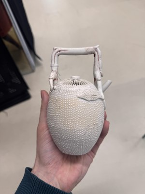 Lot 36 - A rare Chinese biscuit 'double peach' teapot, Qing dynasty, Yongzheng period