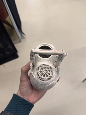 Lot 36 - A rare Chinese biscuit 'double peach' teapot, Qing dynasty, Yongzheng period