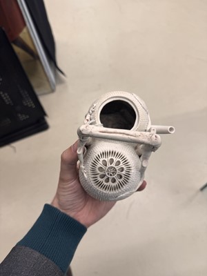 Lot 36 - A rare Chinese biscuit 'double peach' teapot, Qing dynasty, Yongzheng period