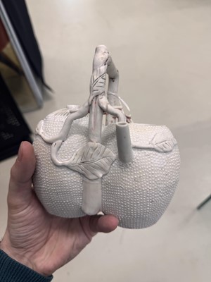 Lot 36 - A rare Chinese biscuit 'double peach' teapot, Qing dynasty, Yongzheng period