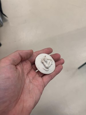 Lot 36 - A rare Chinese biscuit 'double peach' teapot, Qing dynasty, Yongzheng period