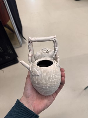 Lot 36 - A rare Chinese biscuit 'double peach' teapot, Qing dynasty, Yongzheng period