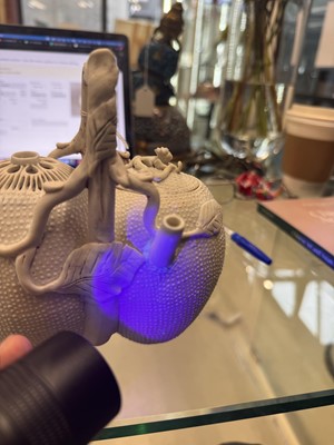 Lot 36 - A rare Chinese biscuit 'double peach' teapot, Qing dynasty, Yongzheng period