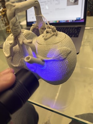 Lot 36 - A rare Chinese biscuit 'double peach' teapot, Qing dynasty, Yongzheng period