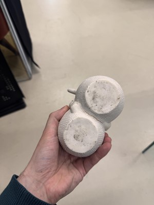 Lot 36 - A rare Chinese biscuit 'double peach' teapot, Qing dynasty, Yongzheng period