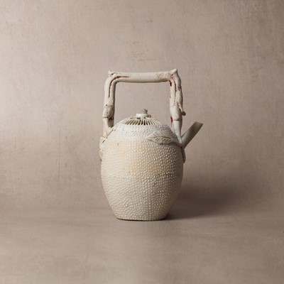 Lot 36 - A rare Chinese biscuit 'double peach' teapot, Qing dynasty, Yongzheng period