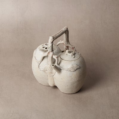 Lot 36 - A rare Chinese biscuit 'double peach' teapot, Qing dynasty, Yongzheng period