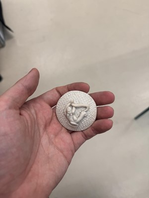 Lot 36 - A rare Chinese biscuit 'double peach' teapot, Qing dynasty, Yongzheng period