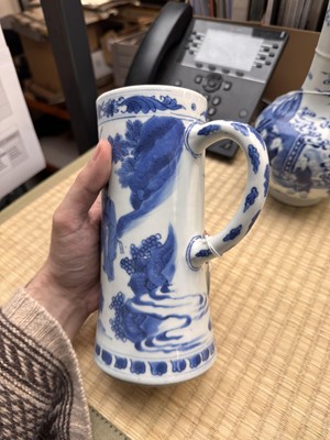 Lot 14 - A fine Chinese blue and white 'scholar' tankard, Ming dynasty, Chongzhen period