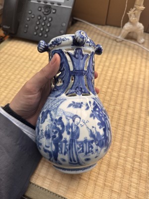 Lot 18 - A rare Chinese export blue and white 'puzzle' jug, Qing dynasty, Kangxi period