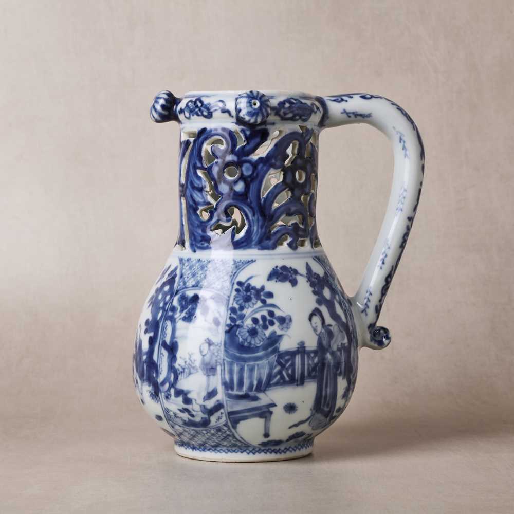 Lot 18 - A rare Chinese export blue and white 'puzzle' jug, Qing dynasty, Kangxi period
