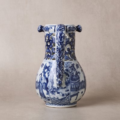 Lot 18 - A rare Chinese export blue and white 'puzzle' jug, Qing dynasty, Kangxi period