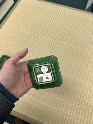 Lot 26 - A pair of small Chinese green-glazed 'dragon' dishes, Qing dynasty, Shunzhi period