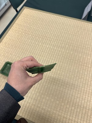 Lot 26 - A pair of small Chinese green-glazed 'dragon' dishes, Qing dynasty, Shunzhi period