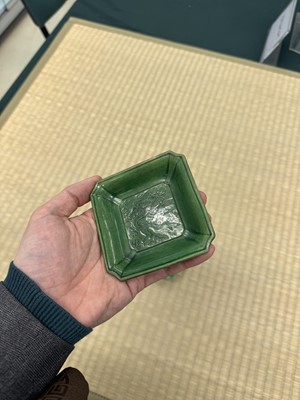 Lot 26 - A pair of small Chinese green-glazed 'dragon' dishes, Qing dynasty, Shunzhi period