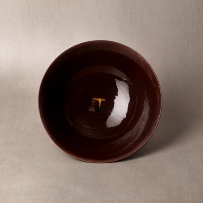 Lot 27 - A Chinese aubergine-ground 'brinjal' bowl, Qing dynasty, Kangxi period