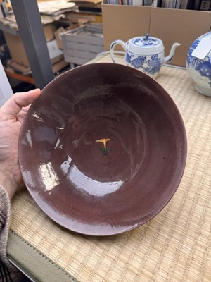 Lot 27 - A Chinese aubergine-ground 'brinjal' bowl, Qing dynasty, Kangxi period