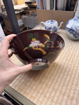 Lot 27 - A Chinese aubergine-ground 'brinjal' bowl, Qing dynasty, Kangxi period
