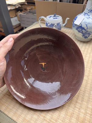 Lot 27 - A Chinese aubergine-ground 'brinjal' bowl, Qing dynasty, Kangxi period